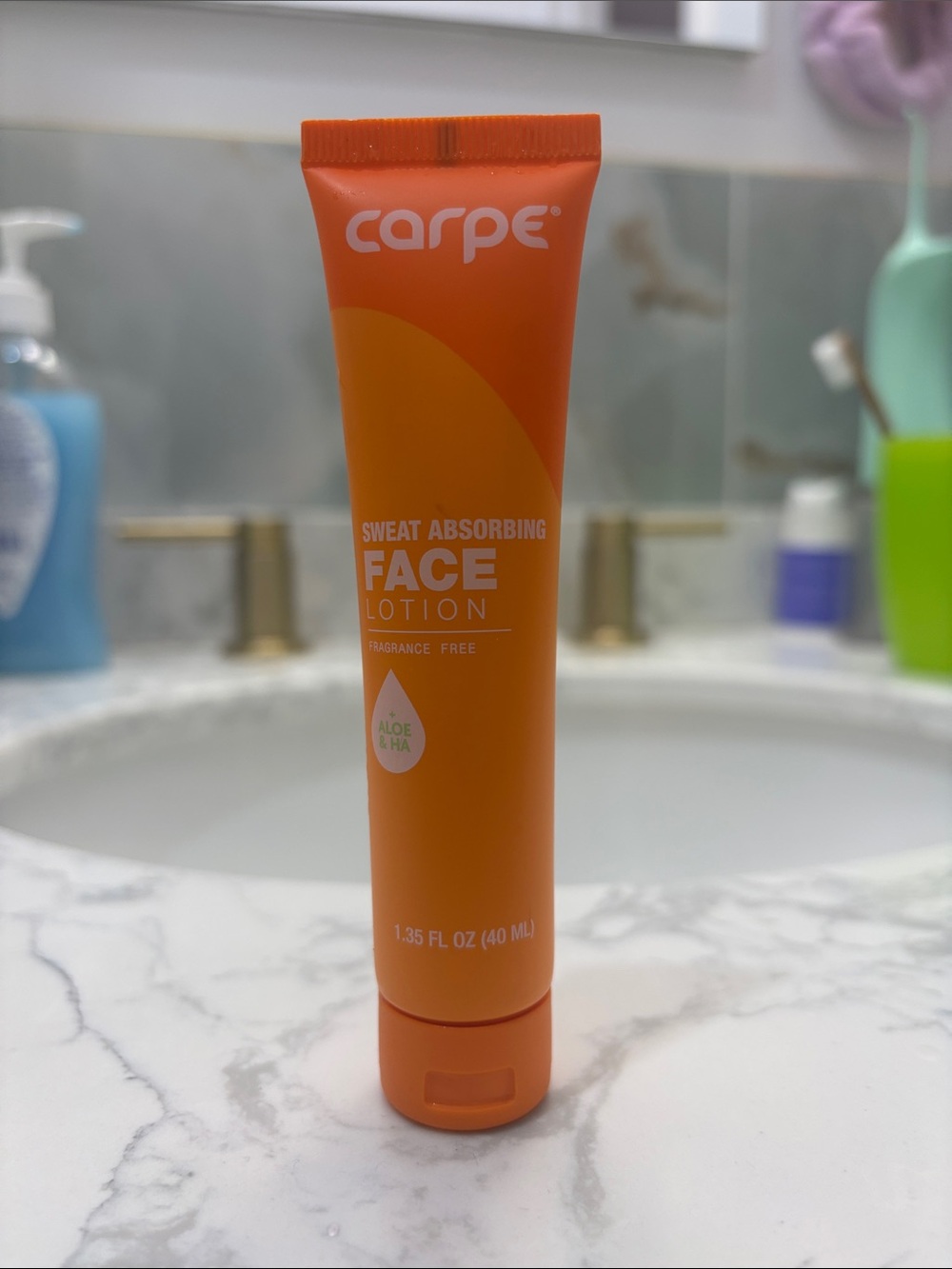 NWT Carpe Sweat Absorbing Face Lotion – Orange
